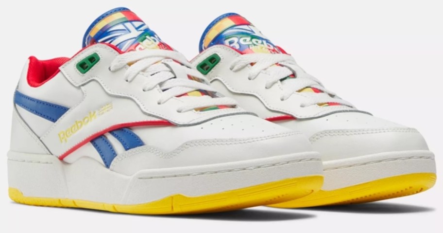 white, yellow, blue and red kid's Reebok shoes