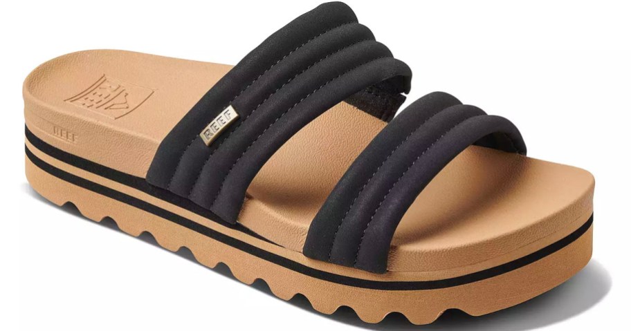 tan and black reef 2 bar sandal stock image
