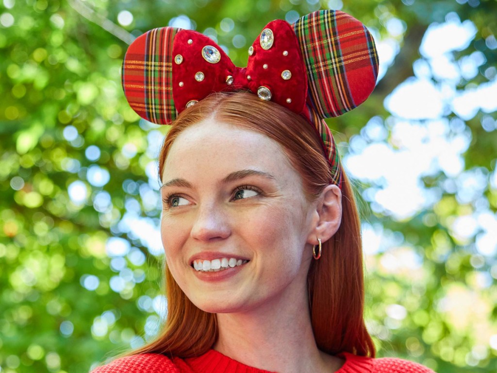 woman wearing red plaid ear headband