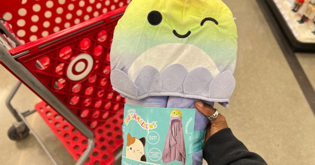 hand holding squishmallows hooded blanket