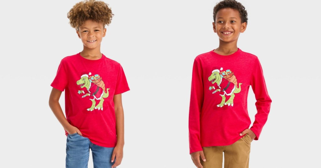 side by side stock images of boys wearing target christmas dino shirts