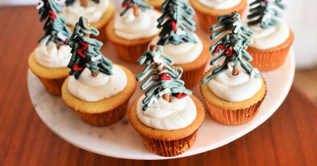 tray with homemade christmas tree topper cupcakes