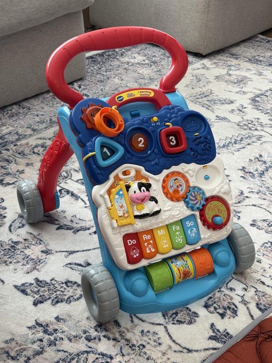 baby walker sitting on gray and white rug
