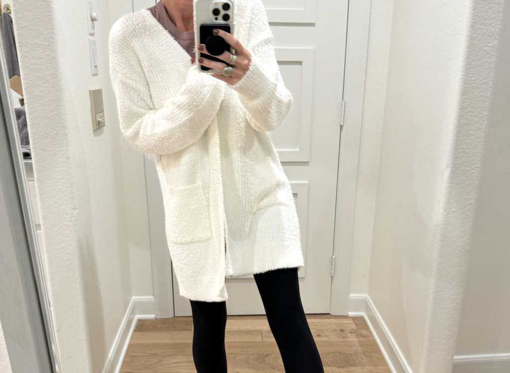 woman wearing white Walmart cardigan with leggings 