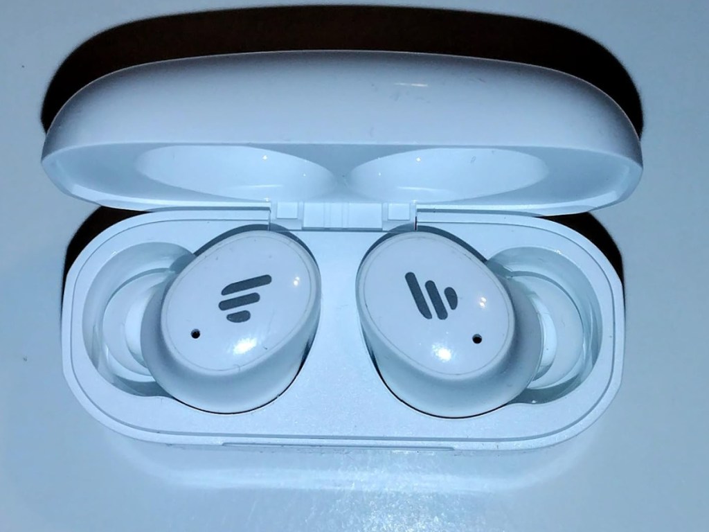 white wireless headphones opened from case
