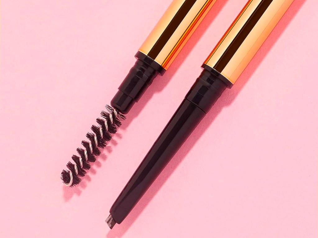 winky lux brow pencil on pink background