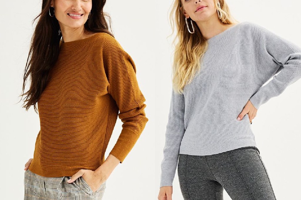 women wearing tan and grey sweaters