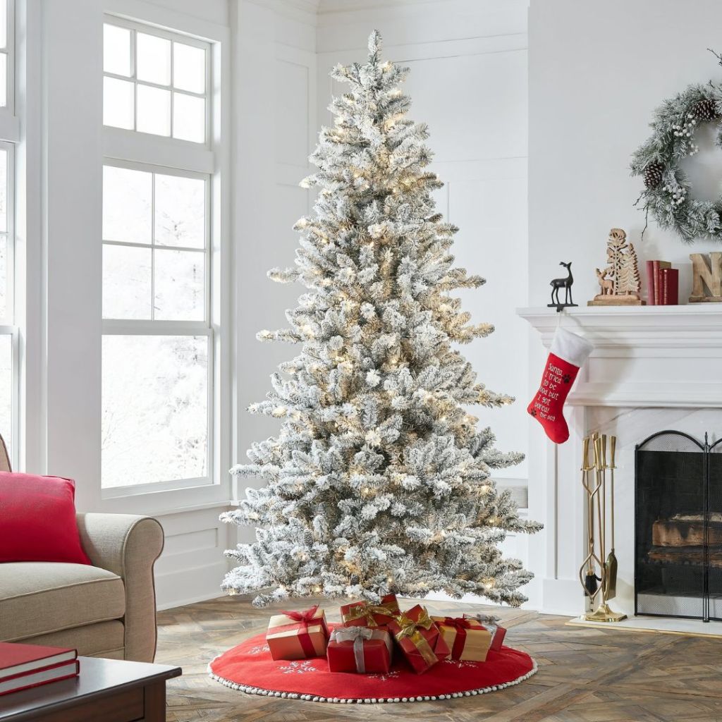 7.5 foot flocked Christmas tree in living room
