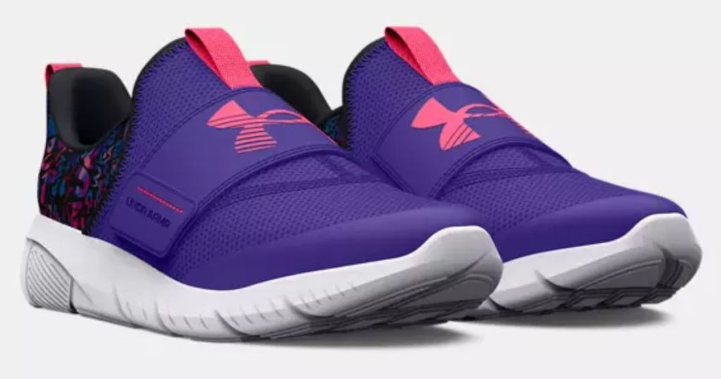 pair of Under Armour girls tennis shoes in purple, pink and black