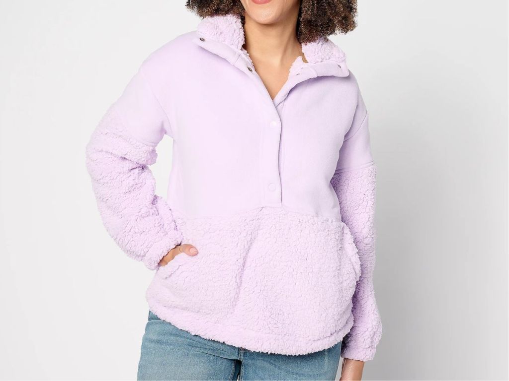 woman wearing a lavender sherpa pullover