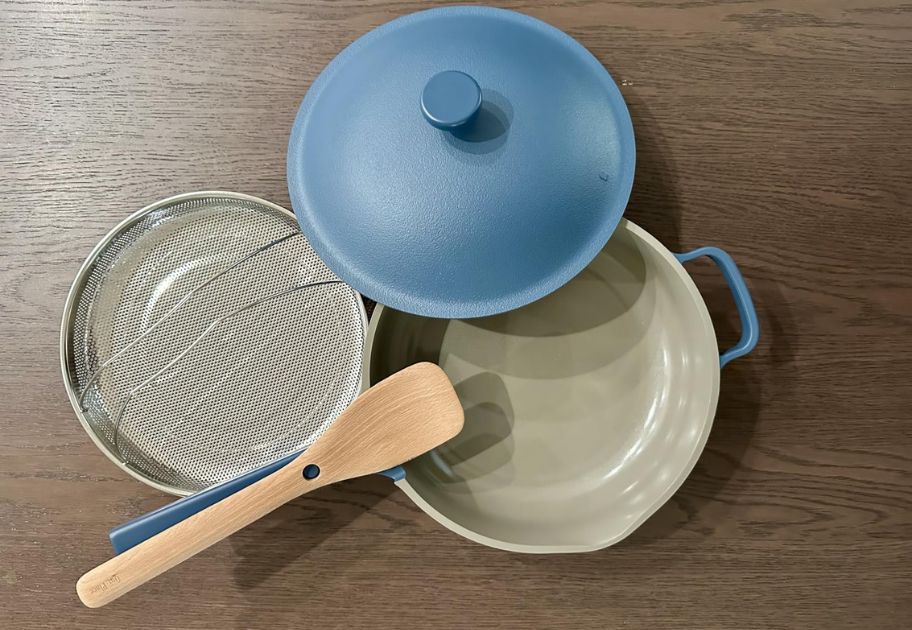 light blue ceramic Our Place Always Pan 2.0 with lid, steamer basket and spatula