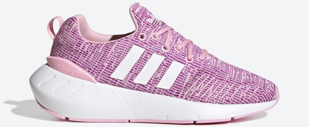pink and white adidas running shoe