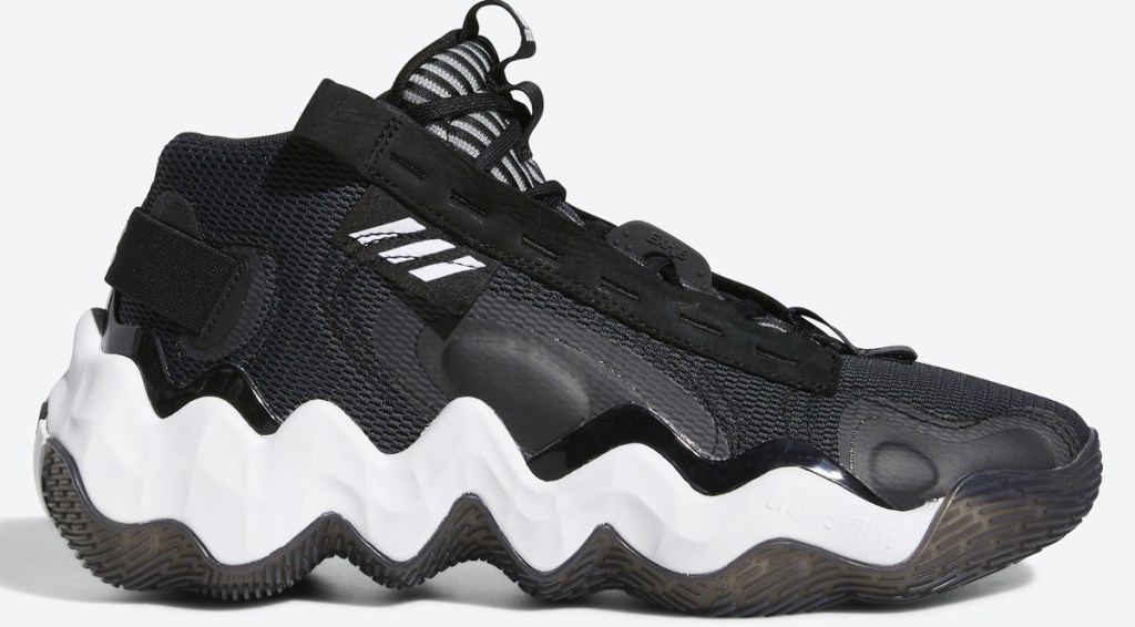 black basketball shoe with white wavy shaped sole