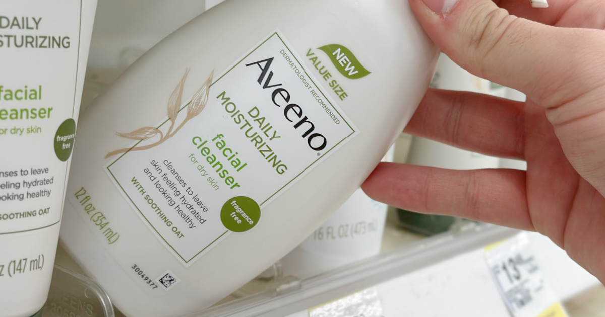 bottle of Aveeno brand facial cleanser on store shelf