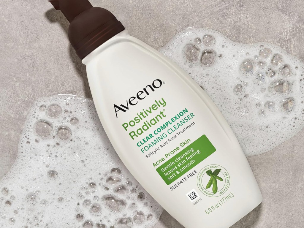 Aveeno Foaming Cleanser surrounded by bubbles