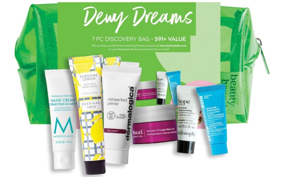 Green beauty bag with mini skin care products in front of it