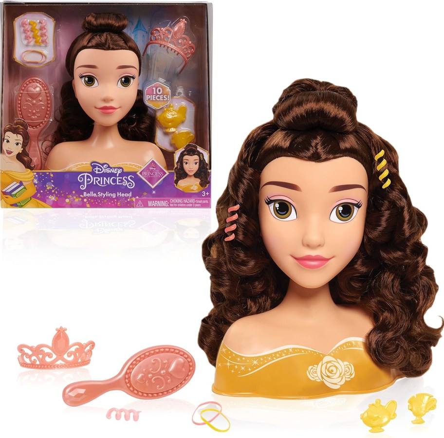 Belle doll with accessories surrounding it