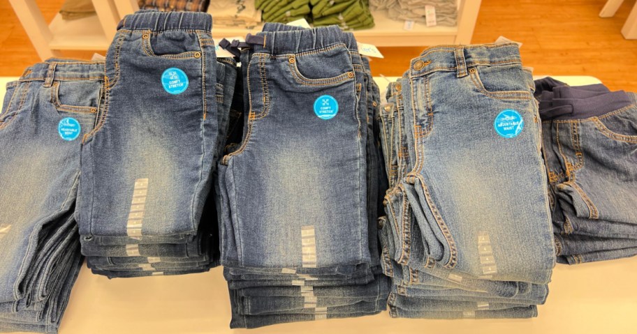 Carters Jeans on table in store display