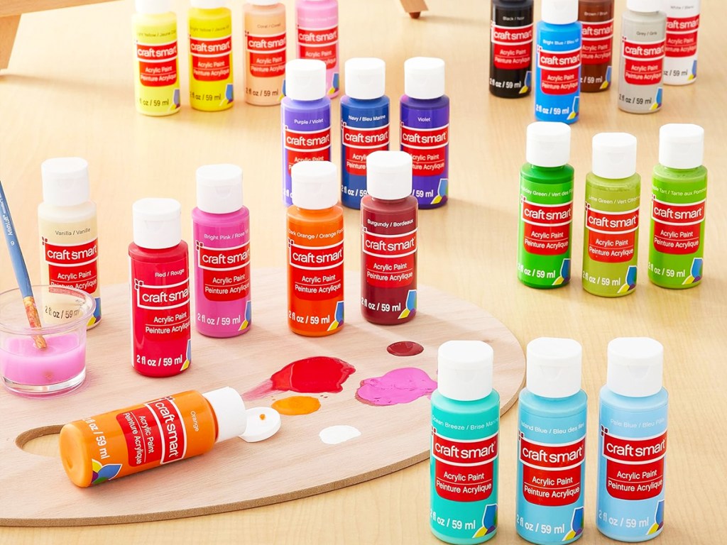 multiple bottles of Craft Smart Acrylic Paints