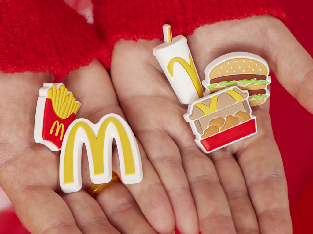 2 hands holding McDonalds jibbitz