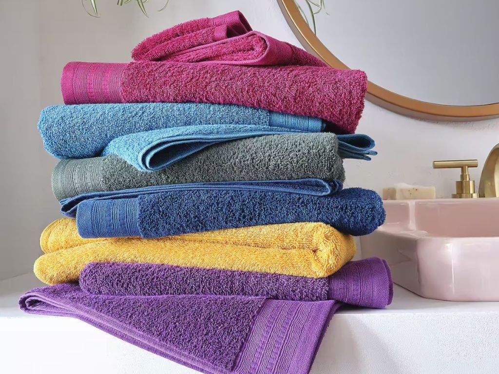 colorful towels stacked on counter