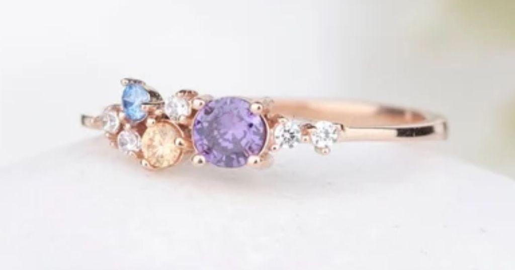 gold women's ring with different color birthstones