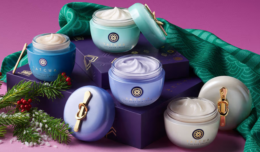 A collection of TATCHA skin care jars in a Christmas display