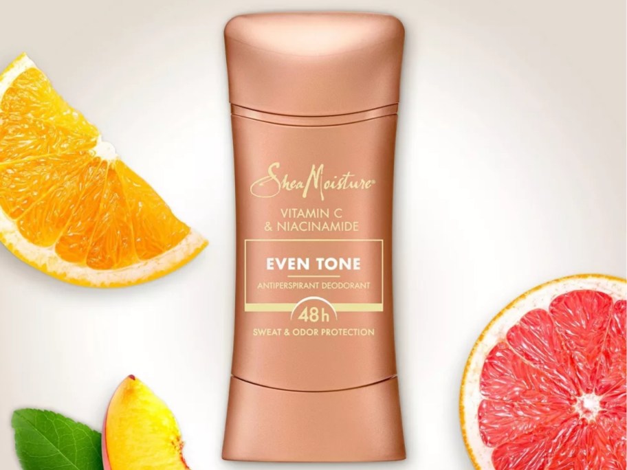 SheaMoisture Even Tone Antiperspirant surrounded by slices of citrus fruits