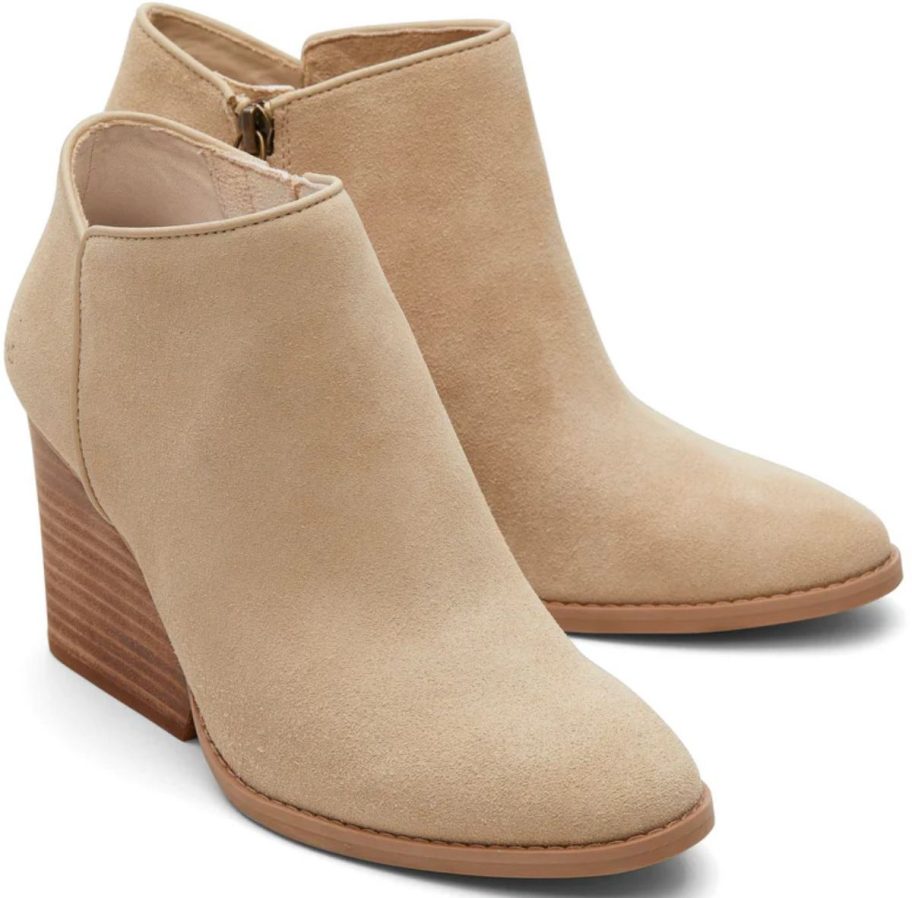 a sand-colored pair of heeled booties