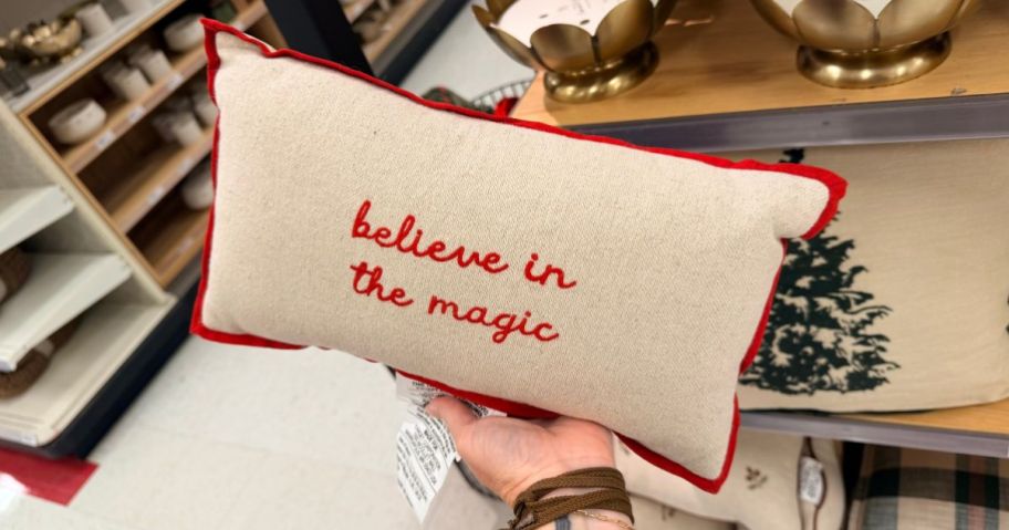 Hearth & Hand with Magnolia 14''x8'' Believe in the Magic Mini Lumbar Christmas Throw Pillow in hand in store