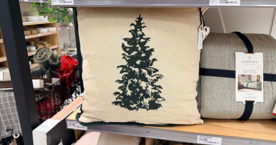Hearth & Hand with Magnolia 18"x18" Christmas Tree Throw Pillow on shelf in store