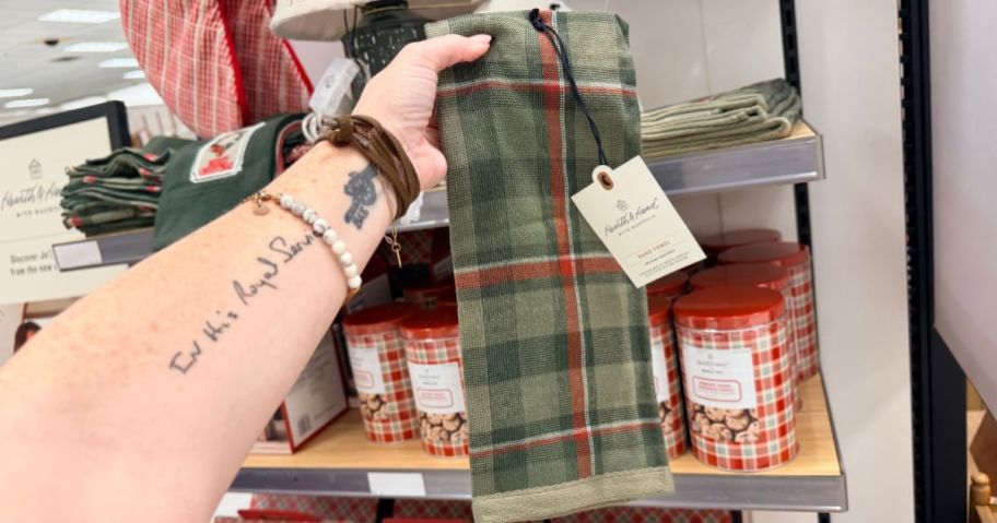Hearth & Hand with Magnolia Christmas Plaid Hand Towel in hand in store