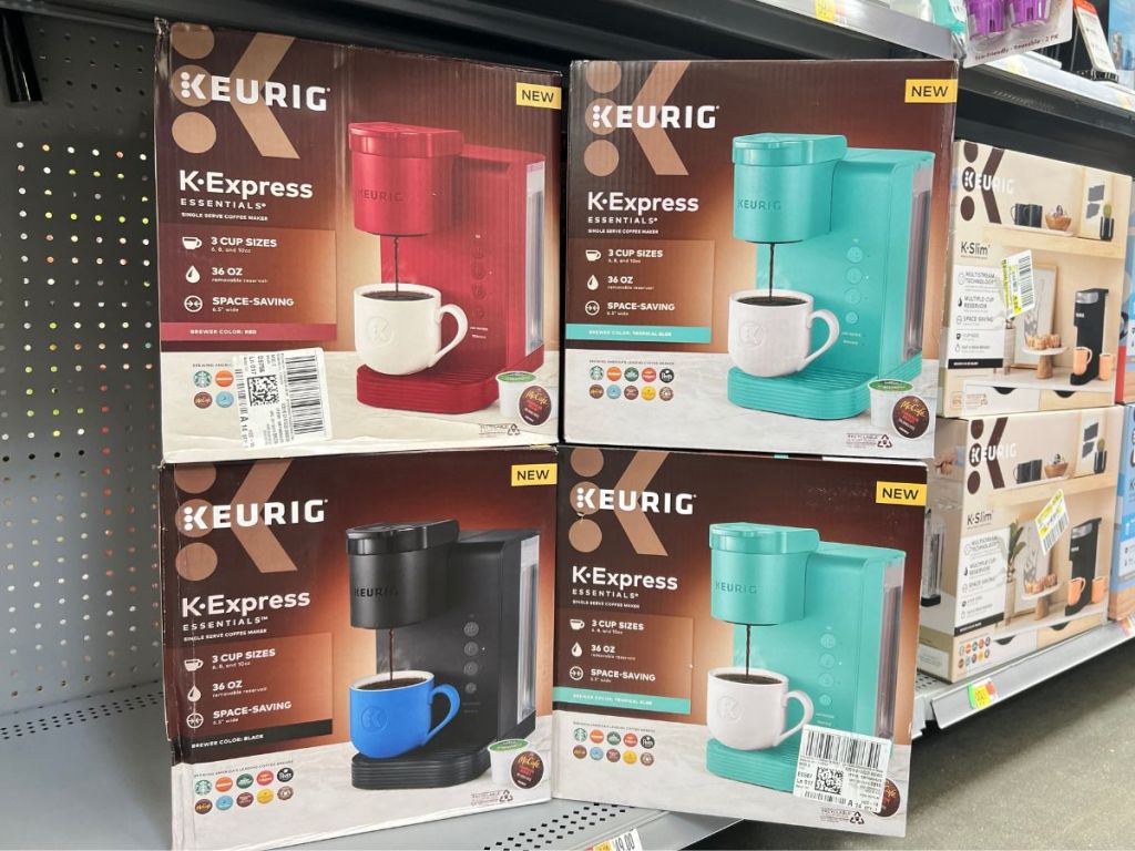 Keurig K-Express Essentials Single-Serve K-Cup Pod Coffee Maker in 3 different colors in boxes on shelf