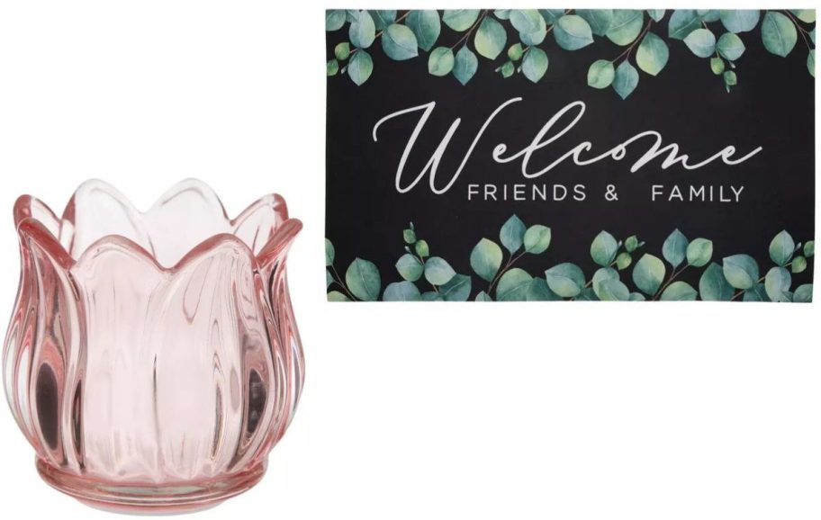 Stock images of a candle holder and a wall sign from Hobby Lobby