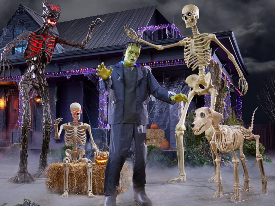 giant skeletons, Frankenstein, and skeleton dog decorations