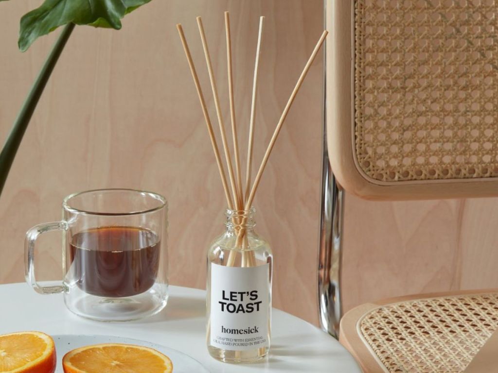 A Homesick reed diffuser on a table