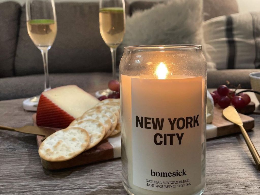 New York Candle with cheese plate in the background