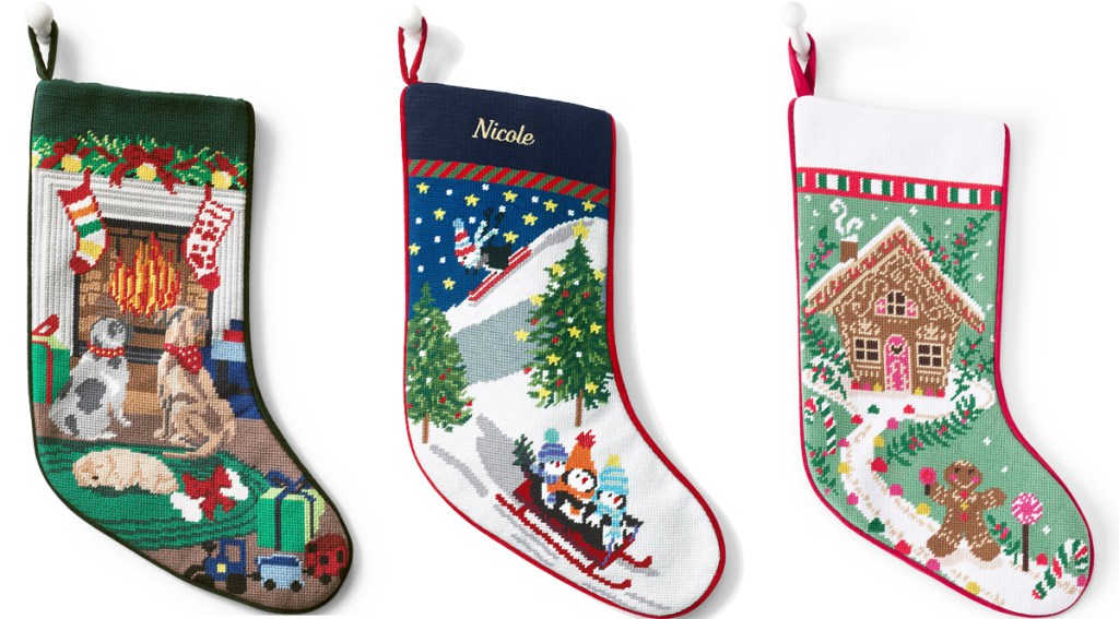 three needlepoint christmas stockings