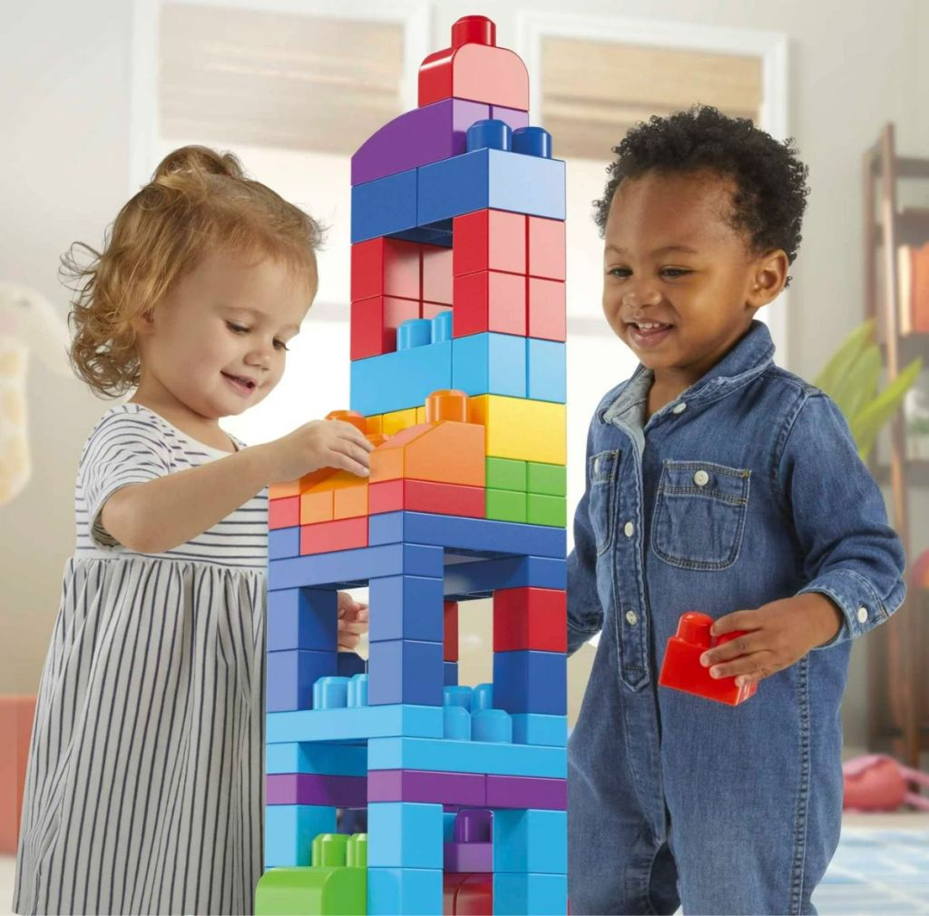 two toddlers playing wiht MEGA BLOKS Fisher-Price Toy Blocks Blue Big Building Bag With Storage