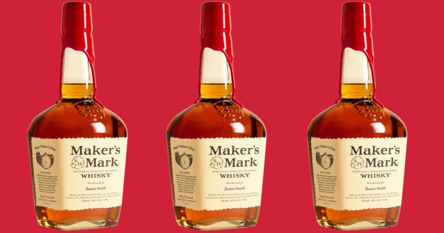 three bottles of Makers Mark with personalized labels