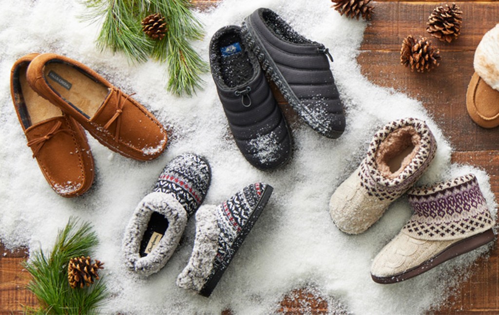 multiple pairs of slippers on top of fake snow
