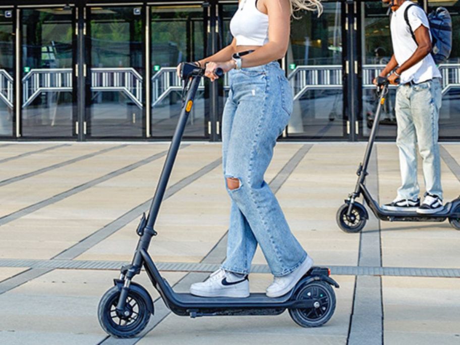 Woman riding an NIU Electric Scooter