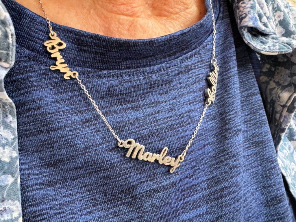 woman wearing name necklace with Bryn Marley and Collin