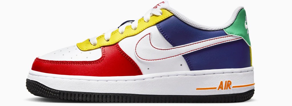 nike kids shoe with red, yellow, green, and blue
