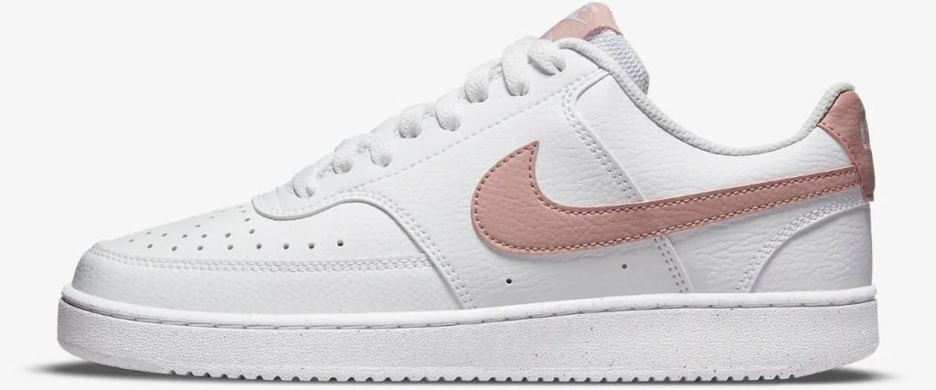 white and pink nike shoe