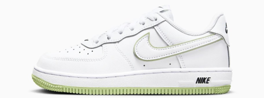 white nike sneaker with light green soles