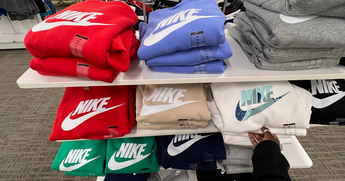 nike hoodies in different colors on store shelf