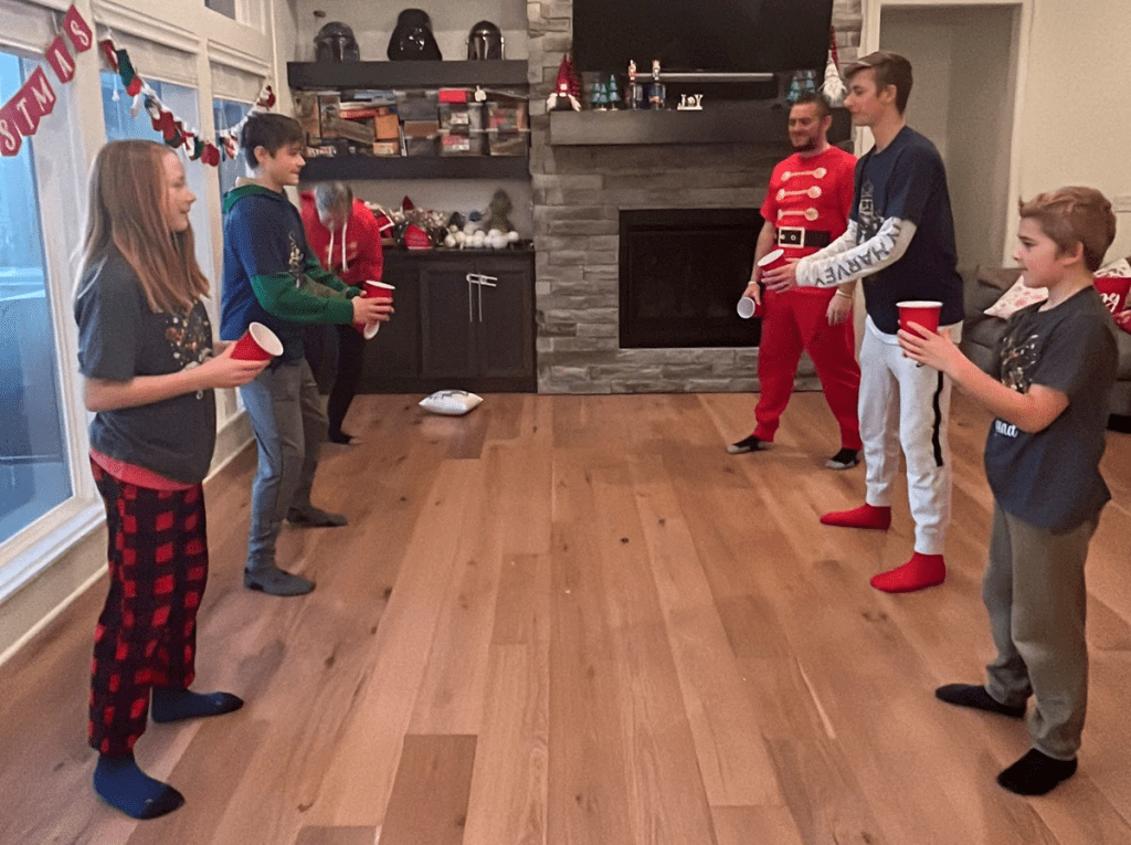 A family playing Christmas party games