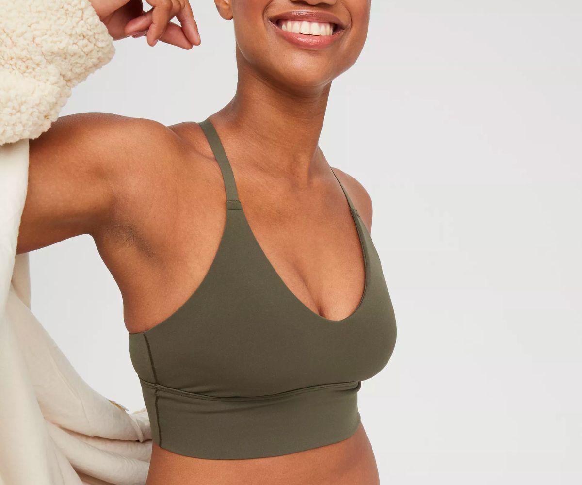 a model wearing an OFFLINE By Aerie Real Me Strappy Back Sports Bra