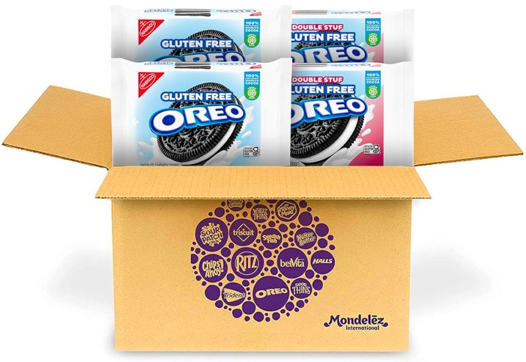 A brown cardboard box with 2 packs each of OREO Original and Double Stuf Gluten Free Cookies sticking up out of the top of the box